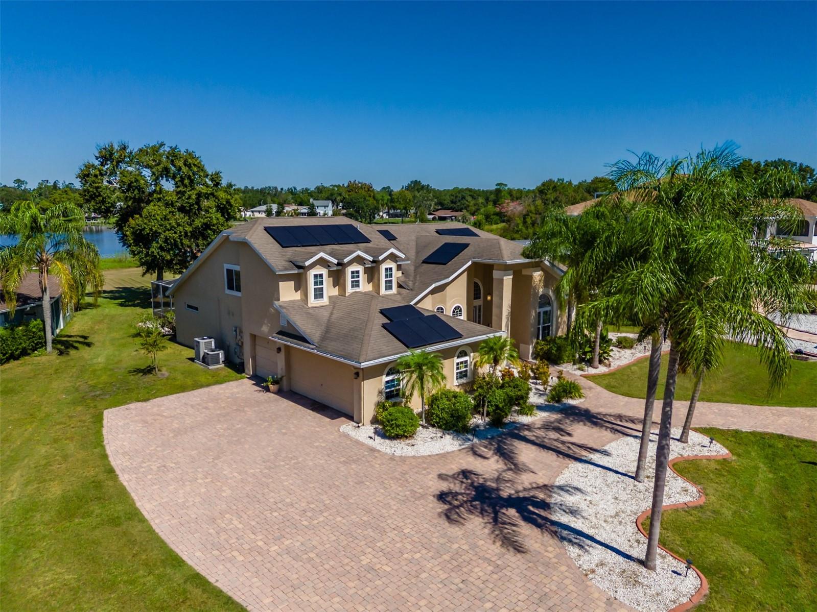 Front Aerial Circular Front of Home Aerial, Driveway w/ tons of Pavers!