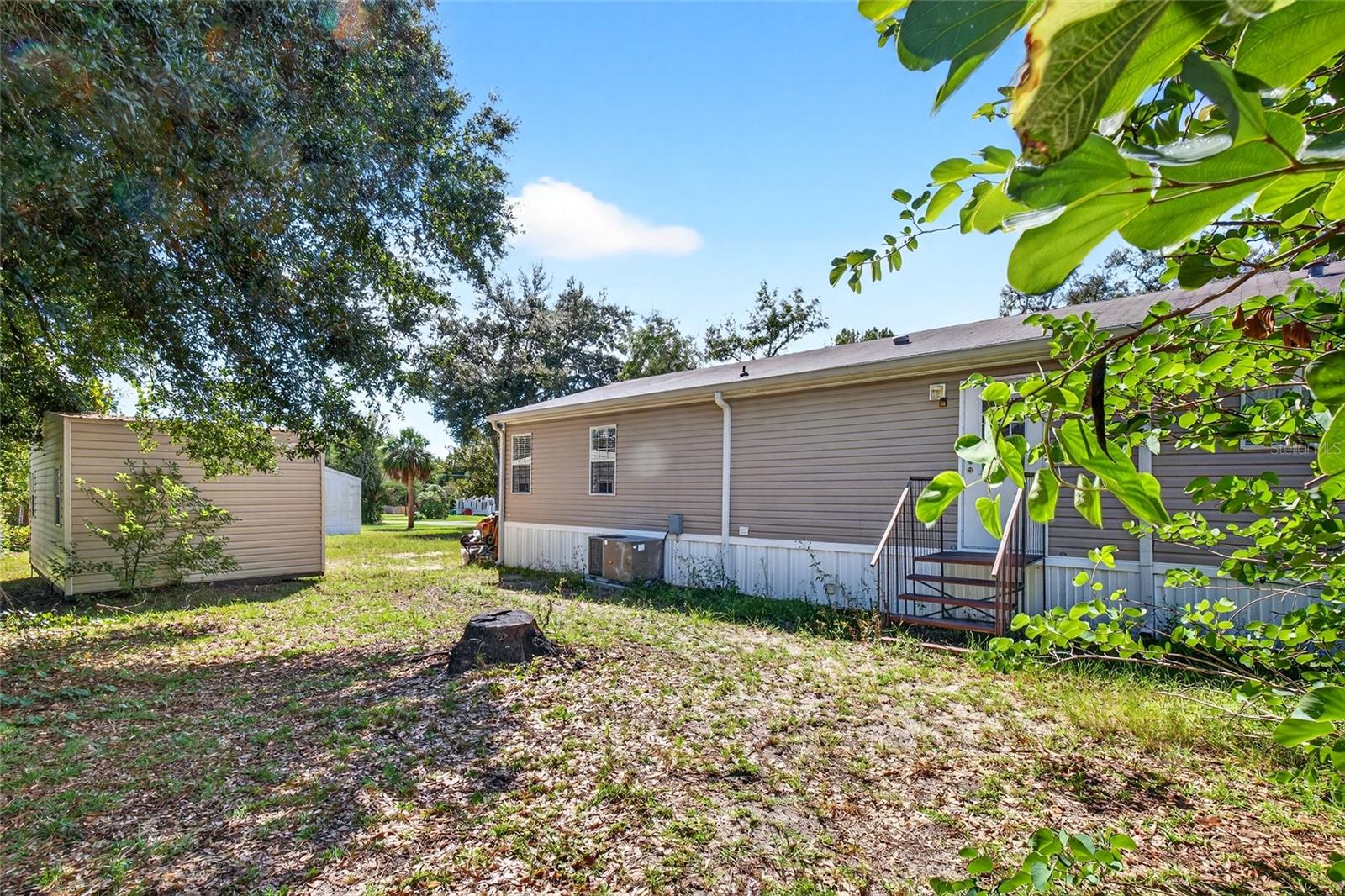 413 QUAIL ST, LADY LAKE, FL, 32159