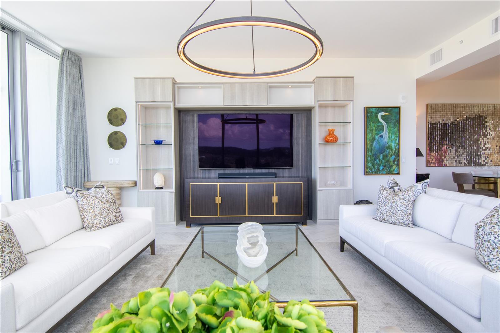 California Closets Custom Entertainment Center with Integrated Lighting