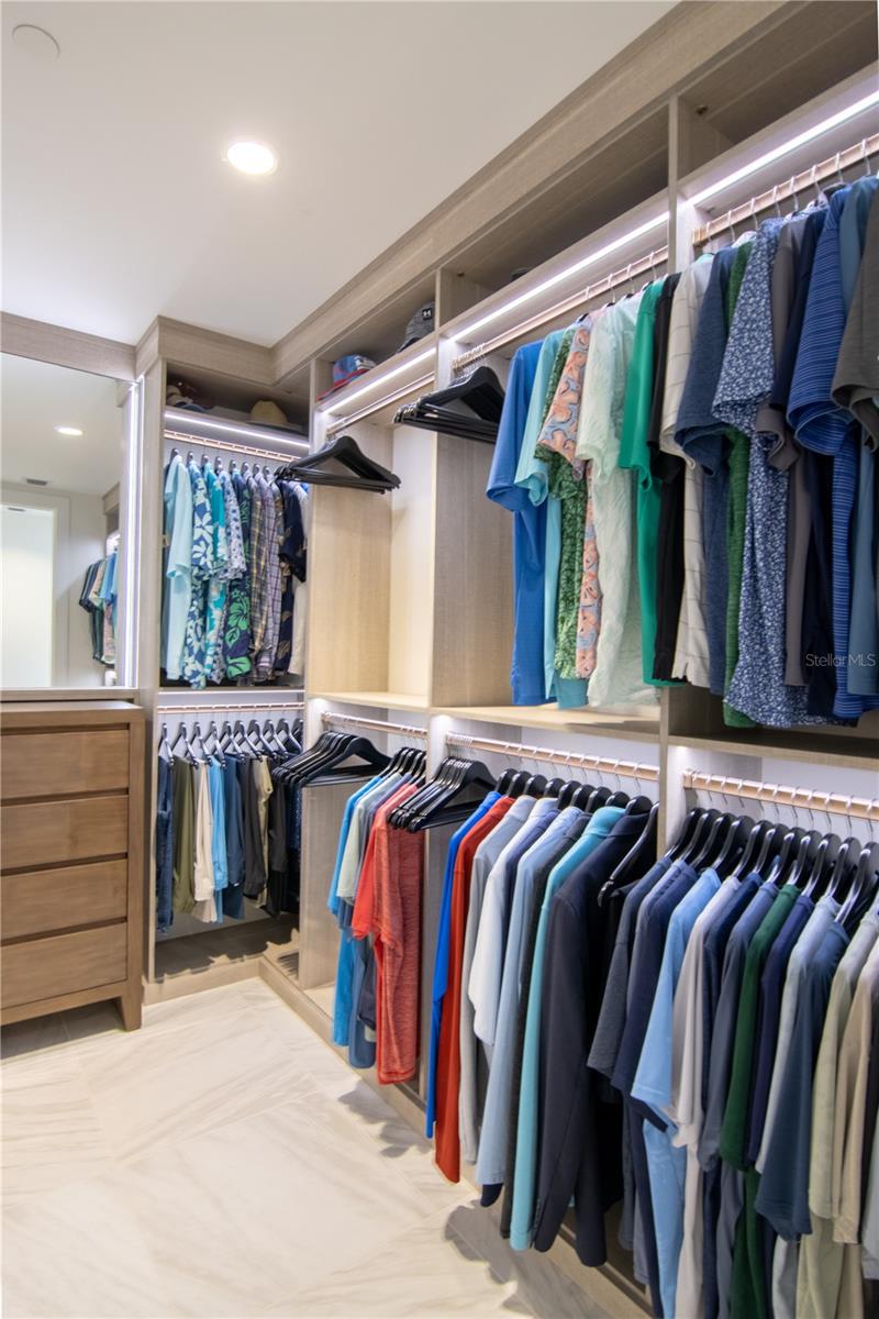 California Closets Primary Suite Pietra Finish and Integrated Lighting