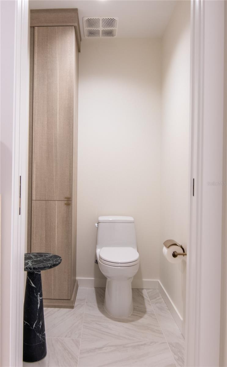 Primary WC with Custom California Closets Storage