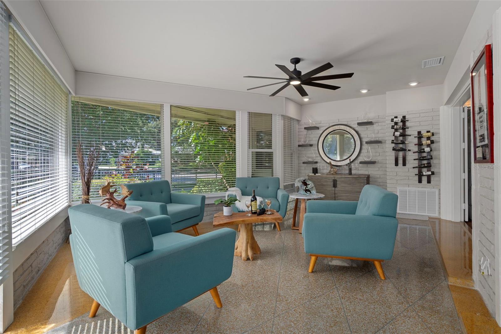 Sitting area filled with natural light—perfect for morning coffee or gatherings with friends.