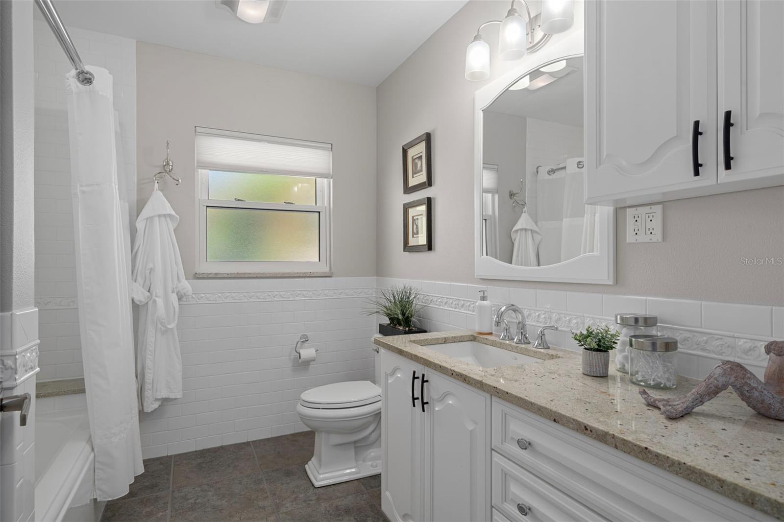 Remodeled hall bath.