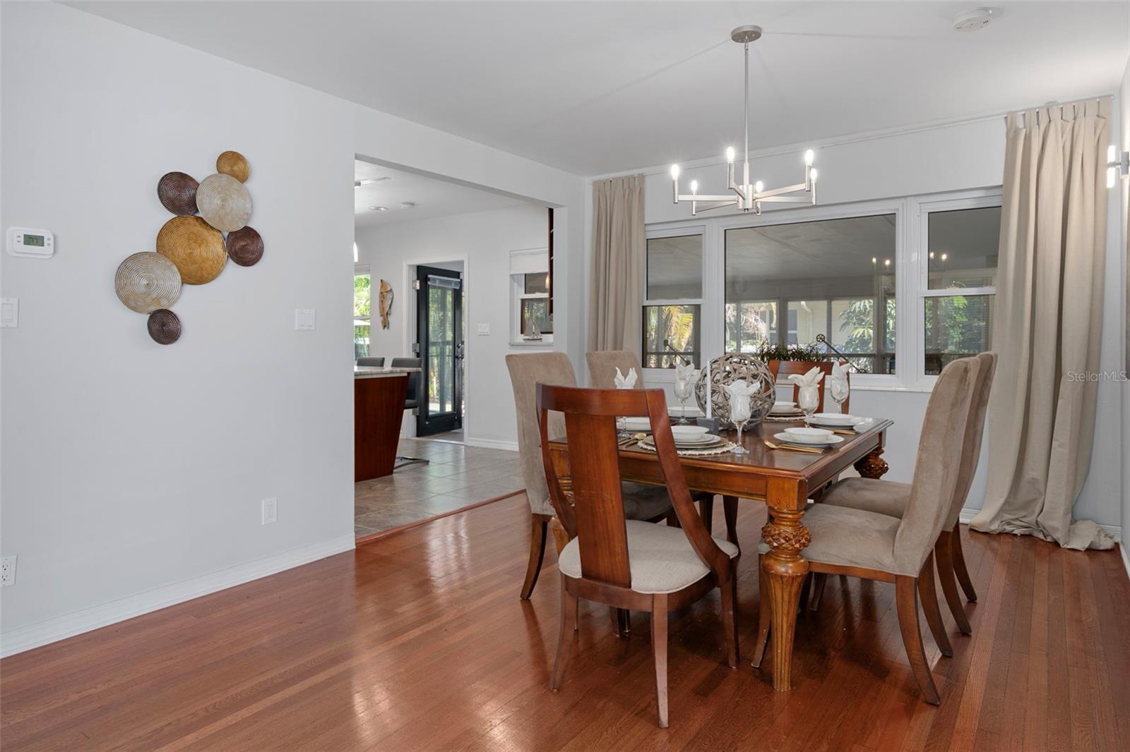 The dining room is conveniently situated just off the kitchen.