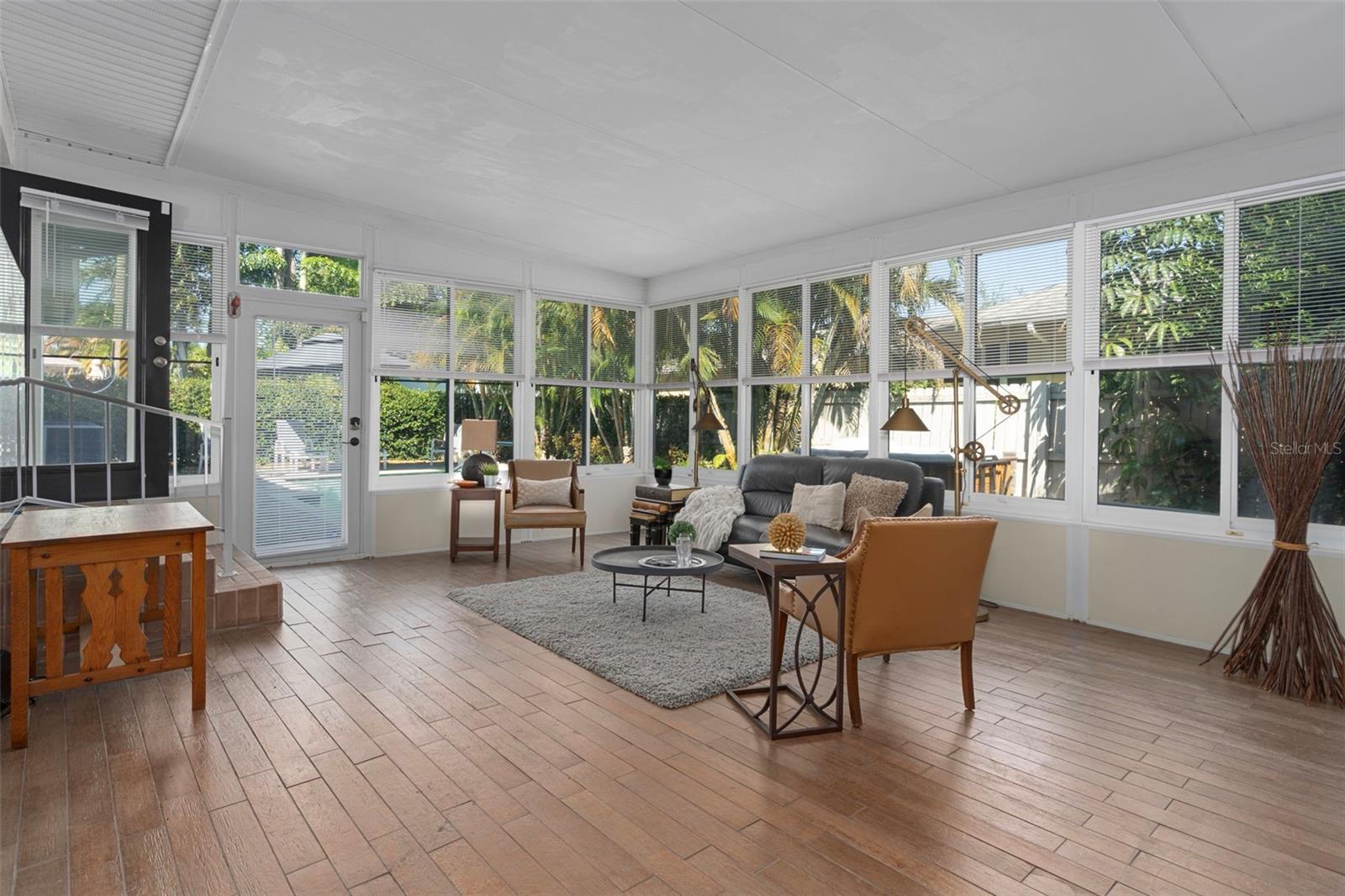 The expansive 24’ × 18’ family room currently used as a media space—great for movie nights or entertaining.