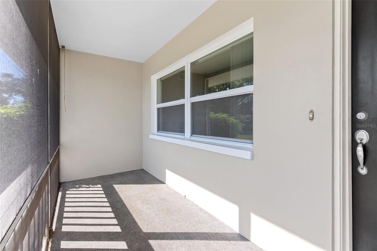 Front Screened Patio. One of two patios!