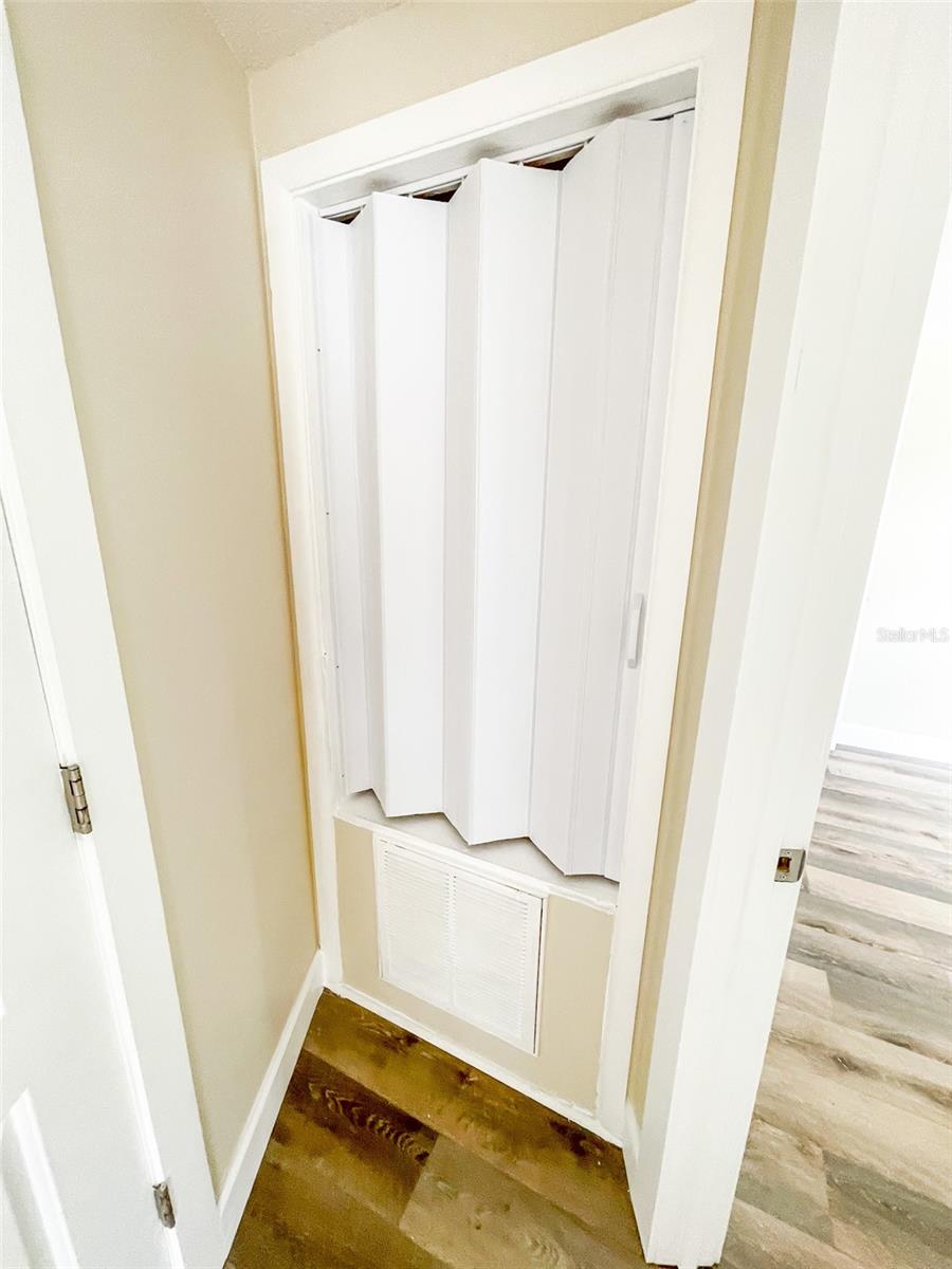 Hall closet for linens outside of bathroom and Bedroom 1