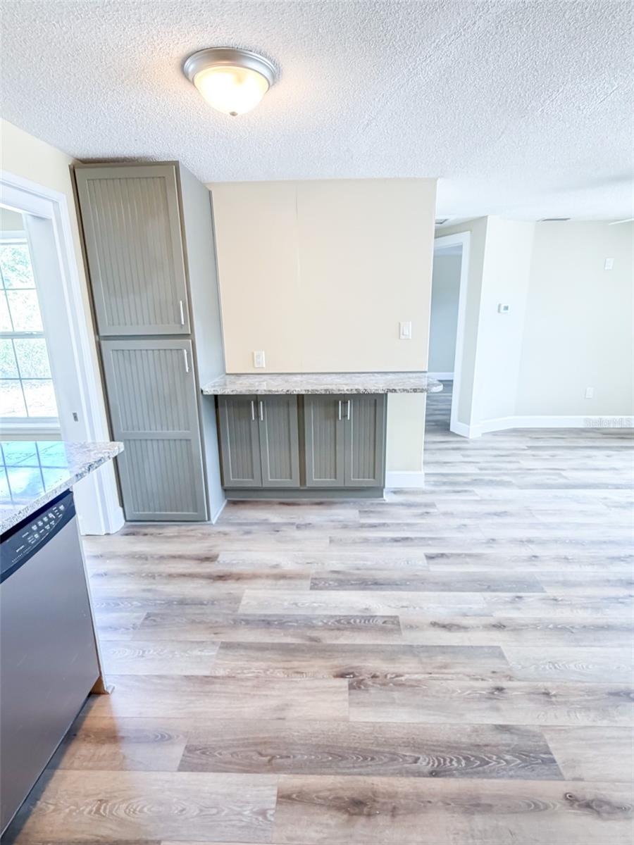 pantry cabinets with countertop made for bar stools