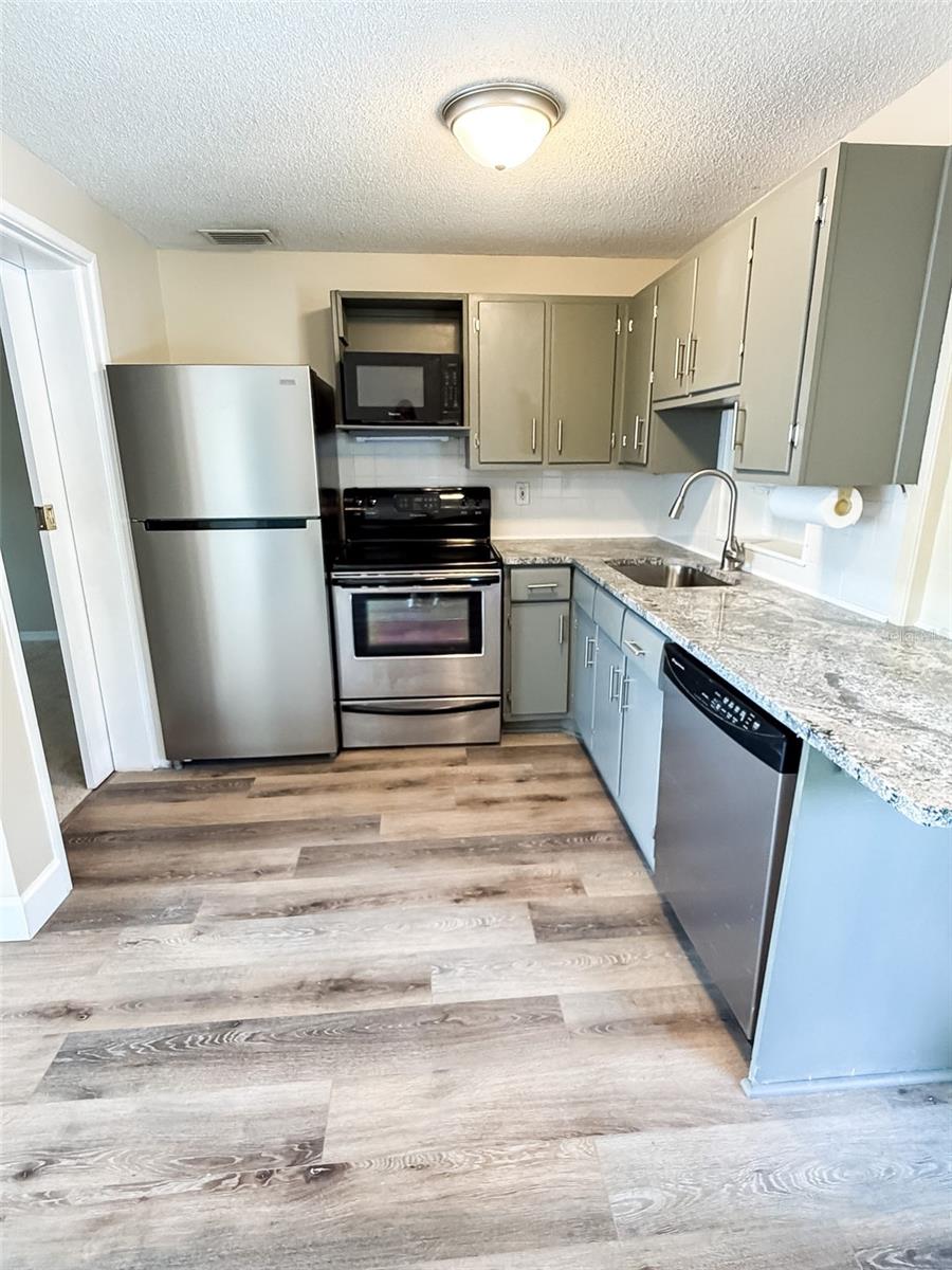 Kitchen features new granite countertops