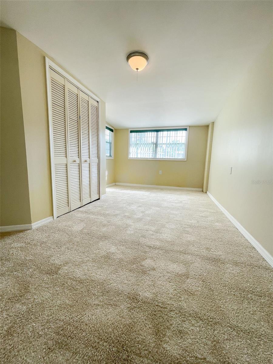 Bedroom 2 is accessed off the kitchen and is adjacent to the family room. The inside laundry room is off this bedroom.