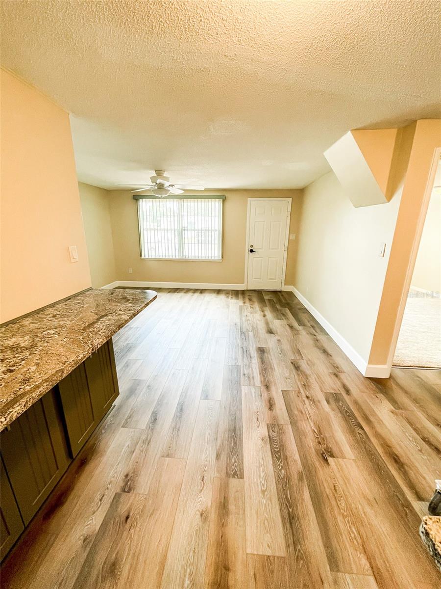 The bar off the kitchen and family room provides seating and additional storage.