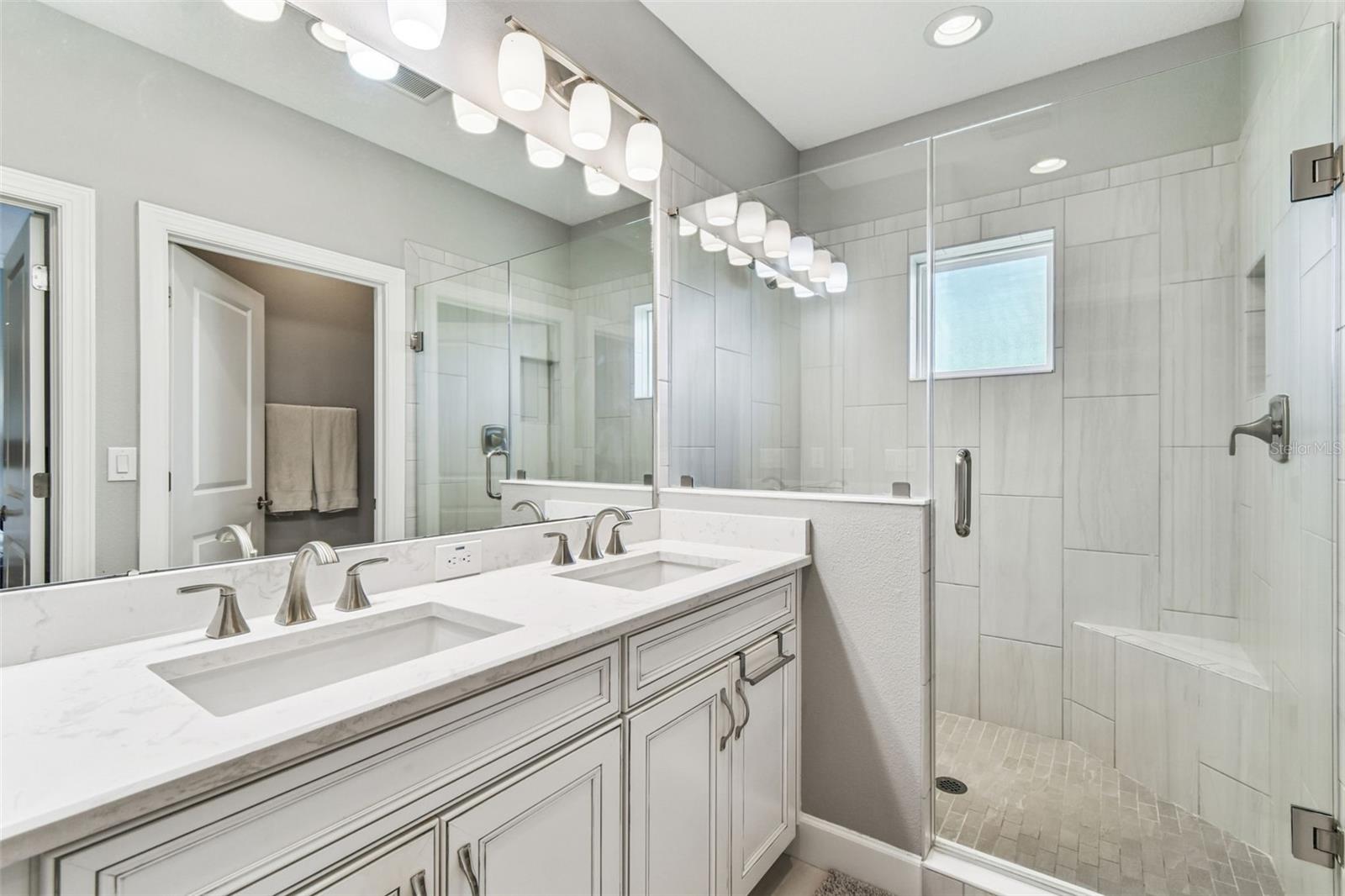 Double Vanity and Walk in Shower.