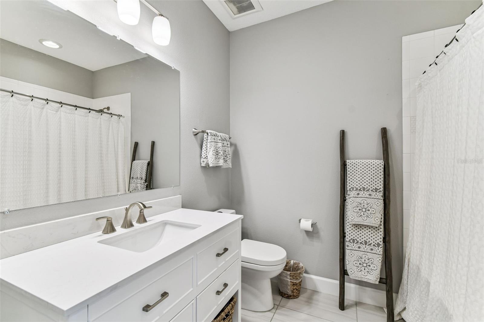 Full Guest Bath Upper Level.