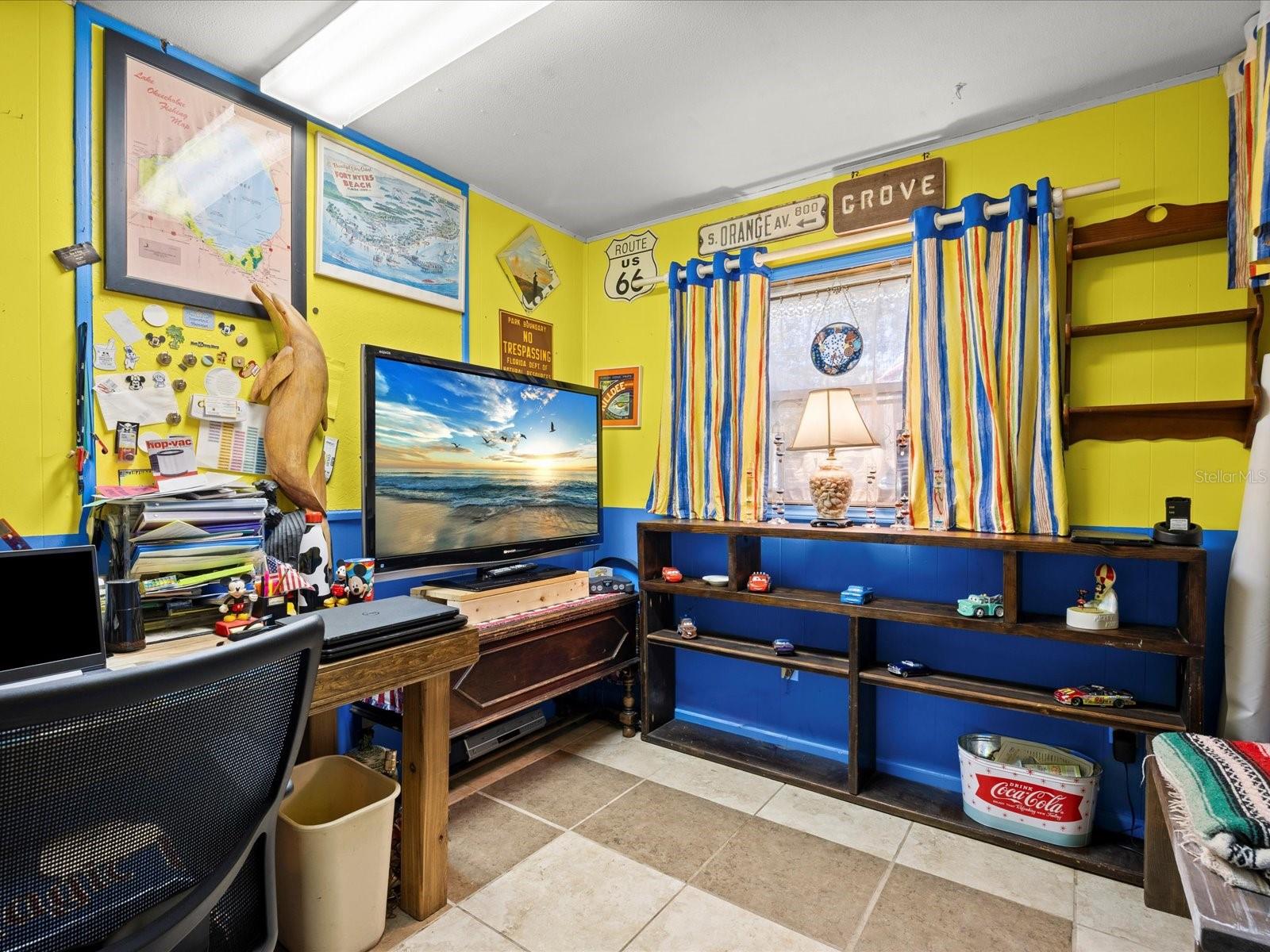 Bedroom 2 set up as office, desk can stay