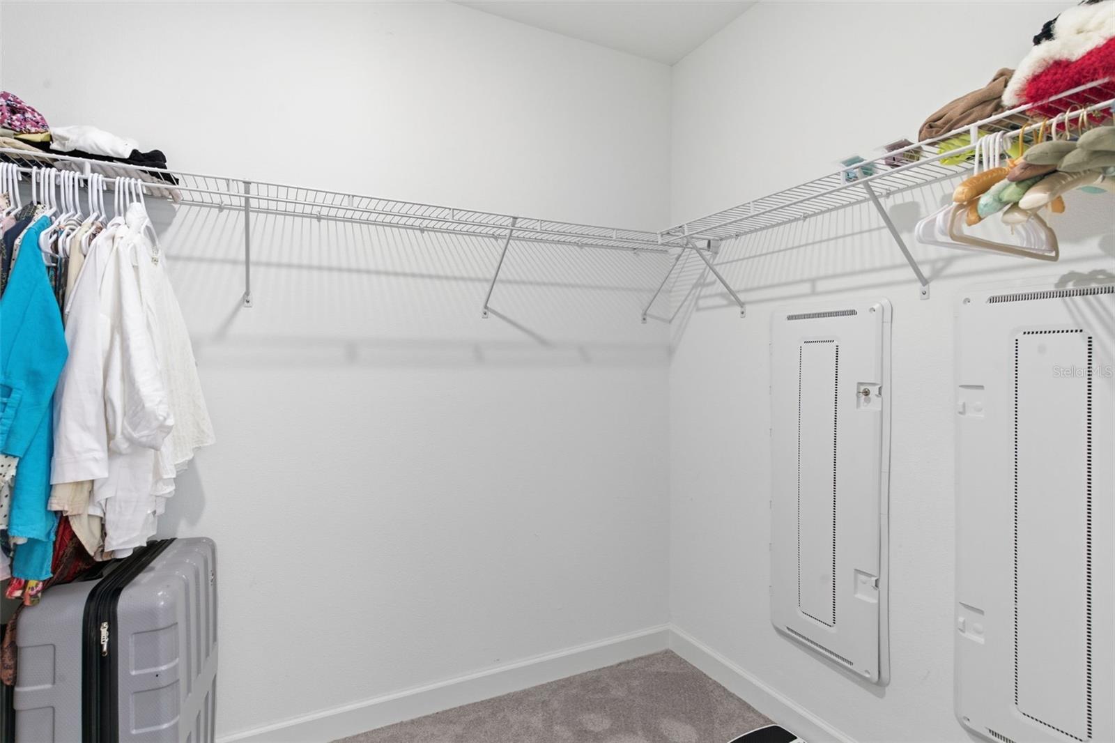 Primary Bedroom walk in closet
