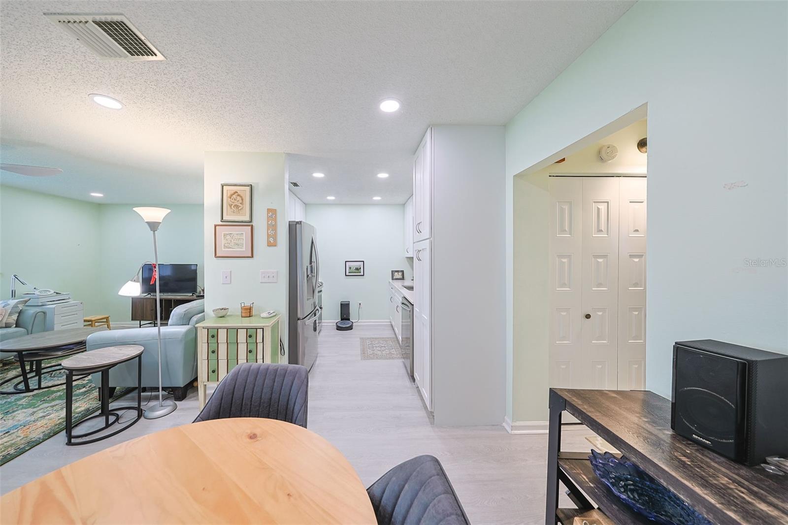 Dining Area looking into the Kitchen and Living Room
