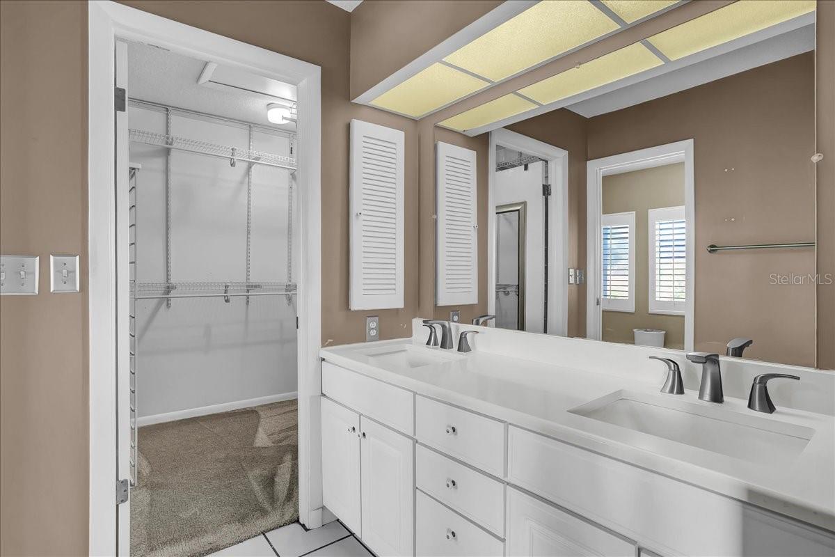 Master bathroom withe plenty of storage and huge walk-in closet