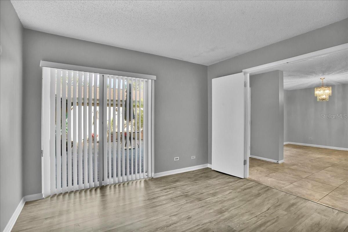 Downstairs front bedroom with adjacent full bathroom