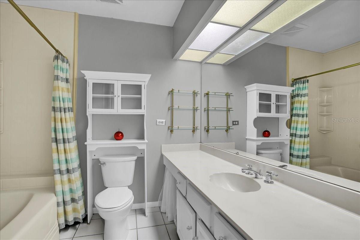 2nd bathroom upstairs with Tub/shower combo and lots of storage