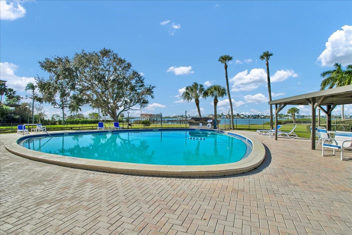 Large pool area with plenty of seating to relax by the Intracoastal waterway