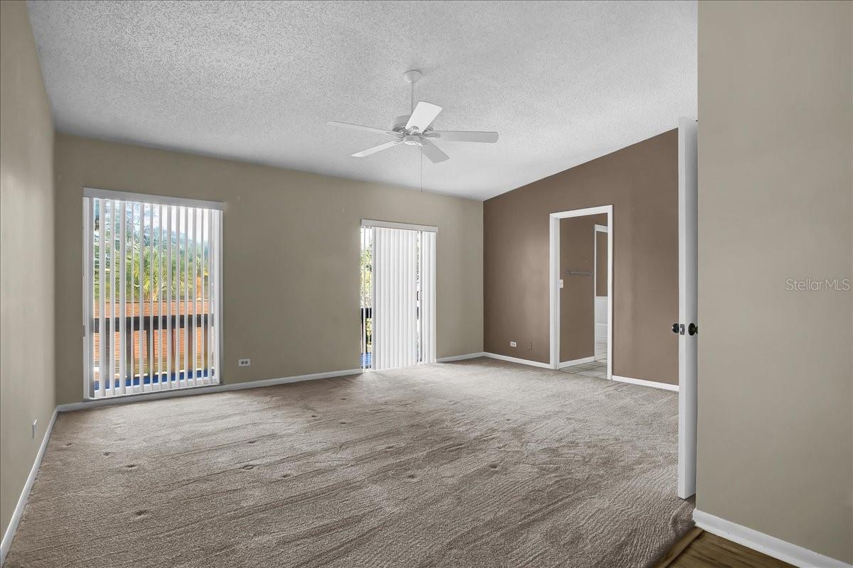 2nd large bedroom upstairs with private balcony to enjoy your morning coffee and enjoy nature