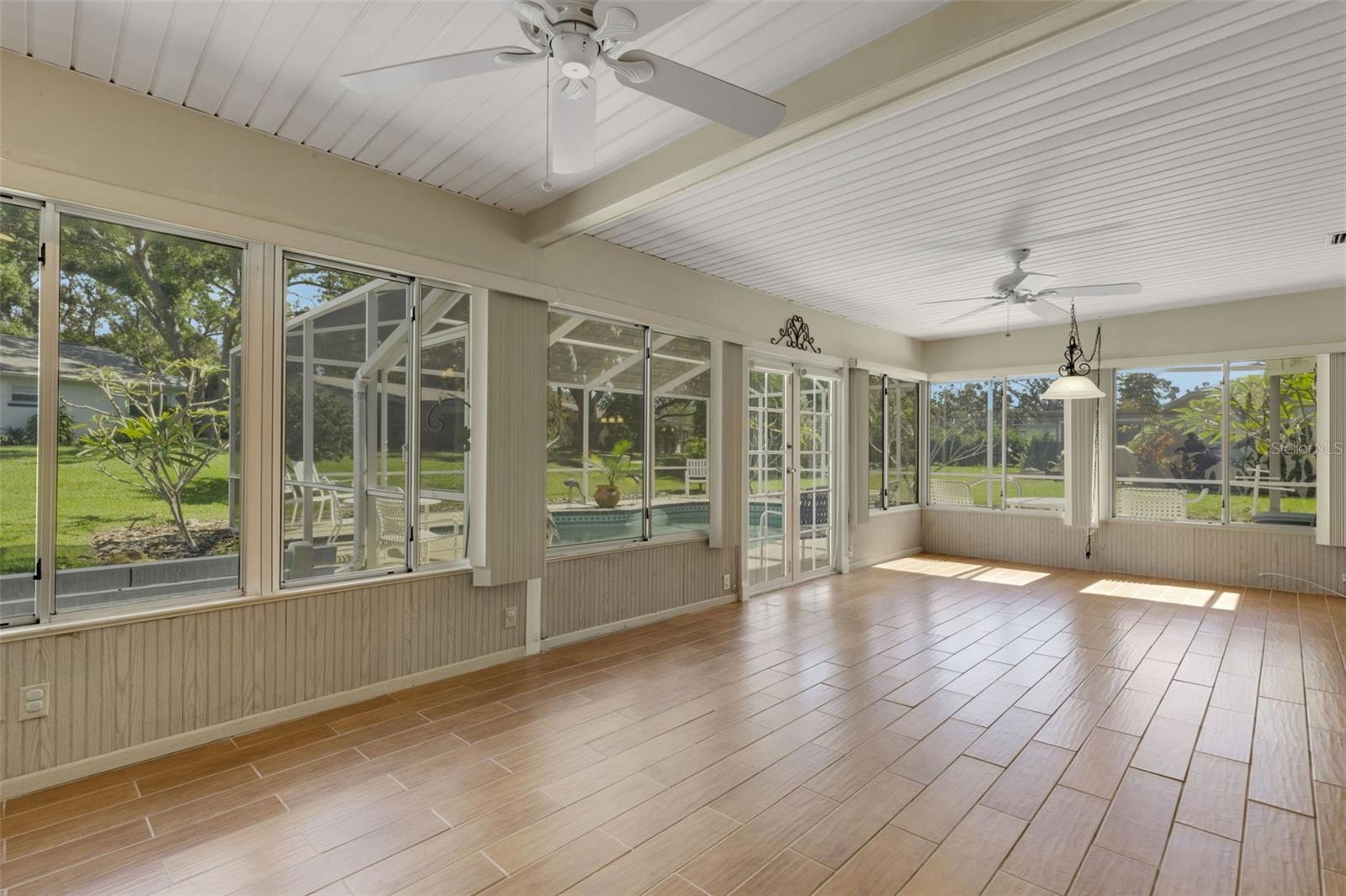 family room with view of pool