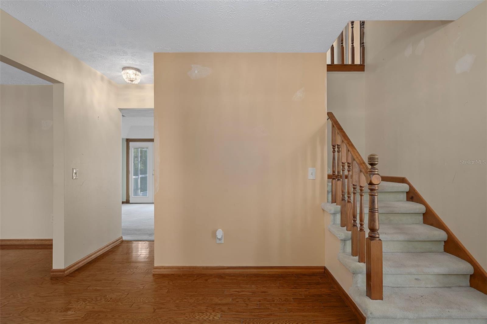 Inside Foyer with Hardwood Floors