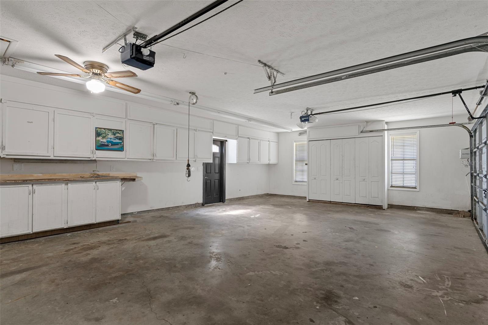 3 Car Side Facing Garage with Workshop Area and Lots of Storage