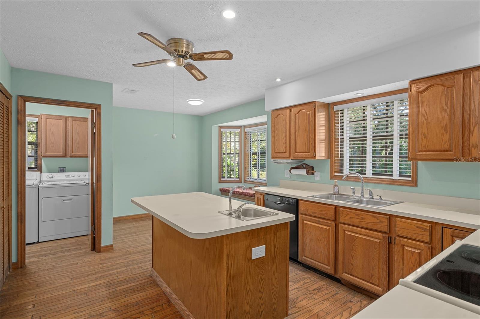 Kitchen with Island, Eat-in-Nook and Hardwood Floors