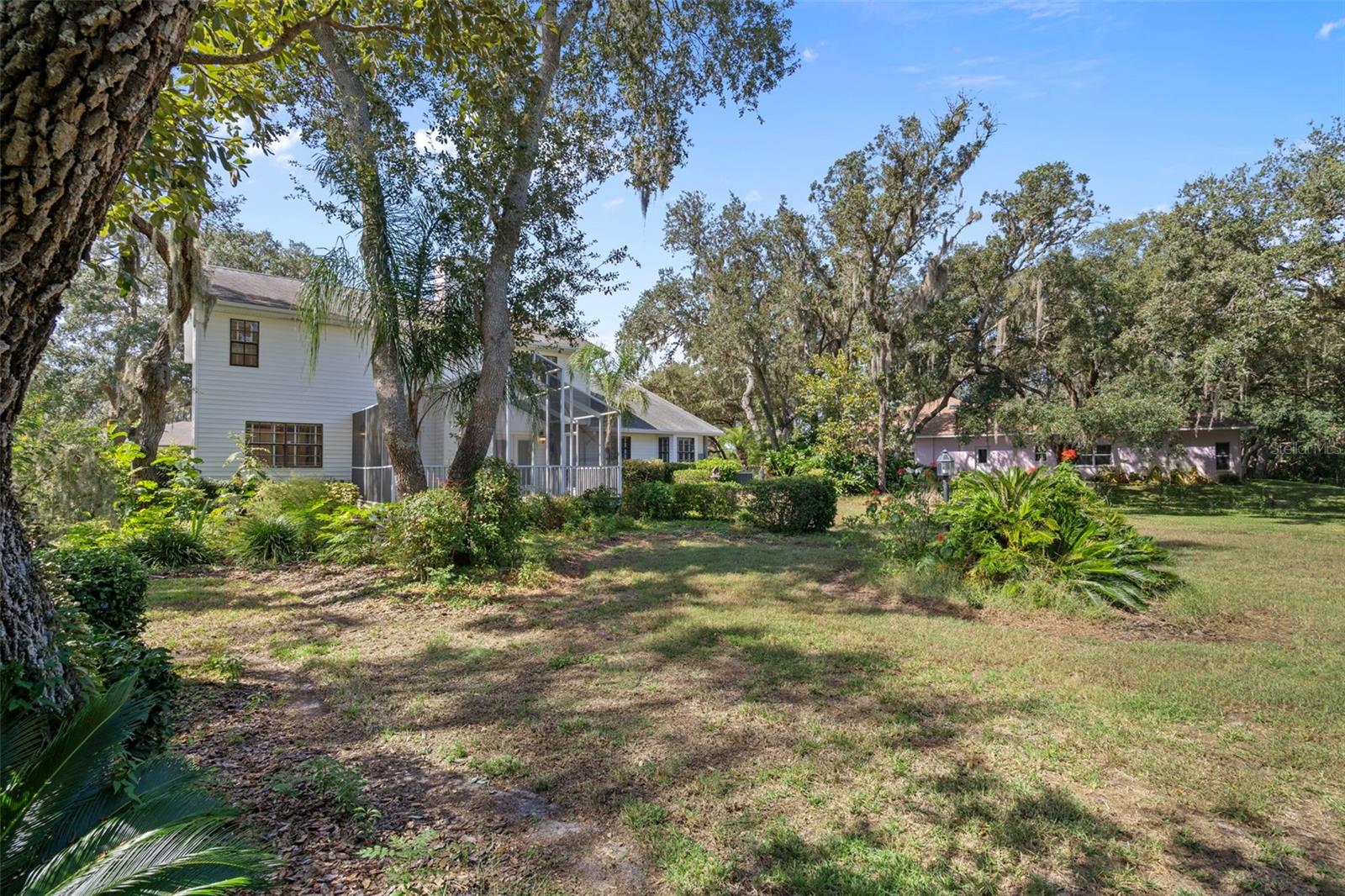 Rear of Home with Beautiul Landscaping