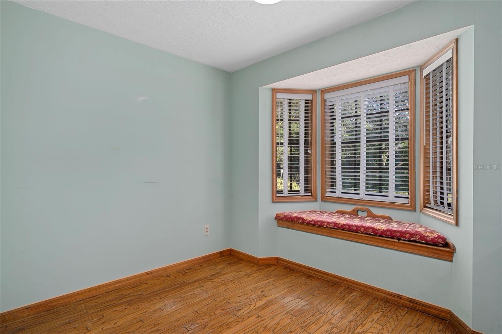 Kitchen Nook with Bay Window/Seat and Hardwood Floors
