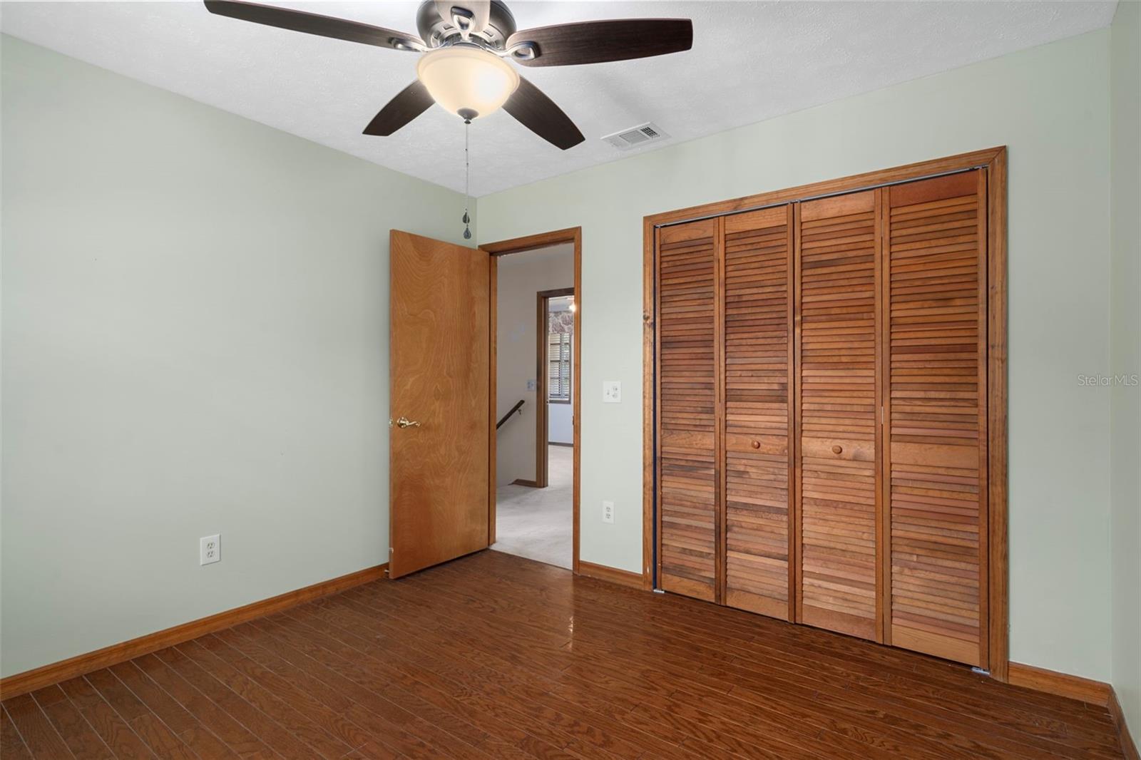 Upper Level Bedroom 4 with Hardwood Floors