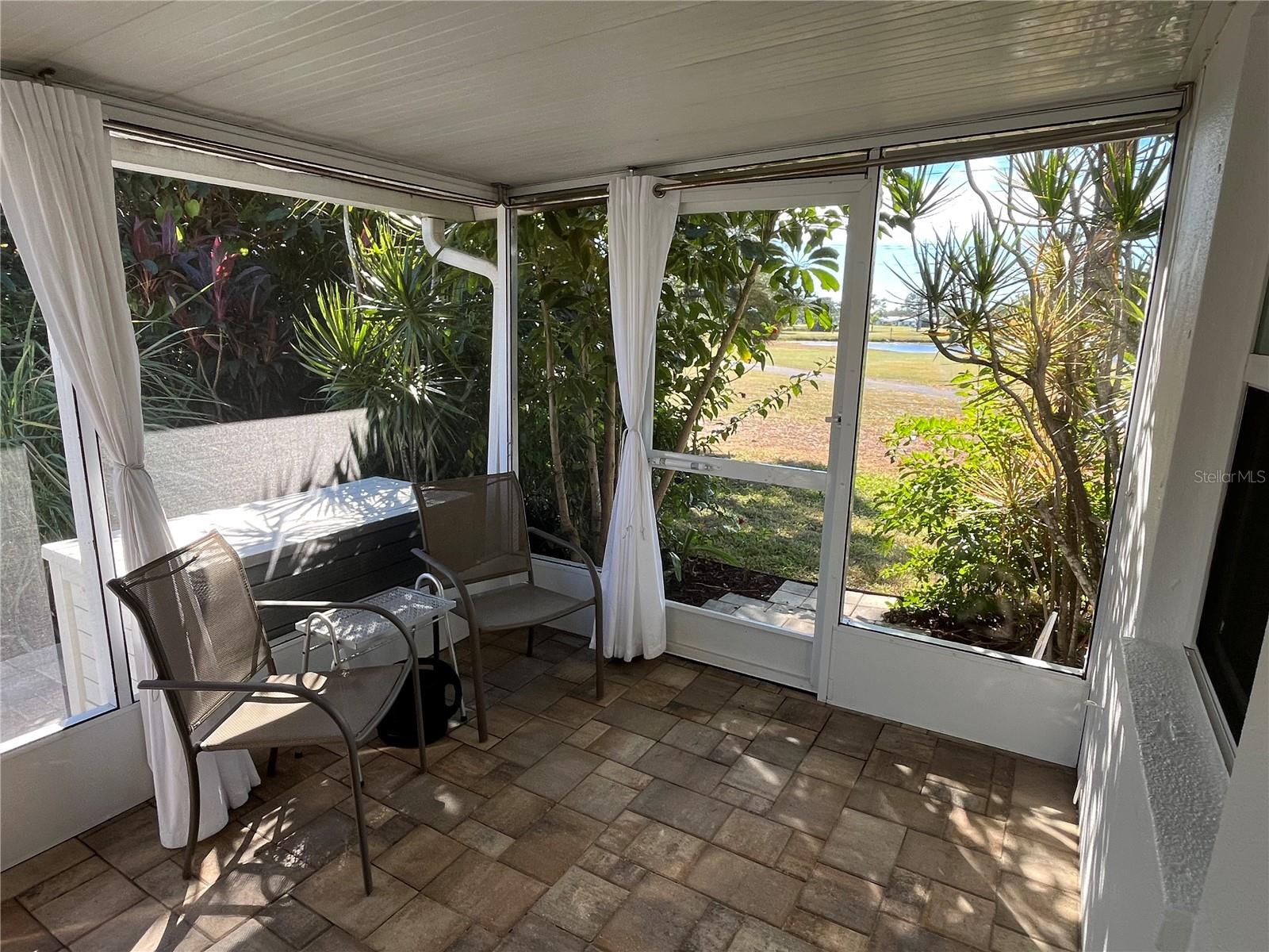 Back Patio overlooking lake and golf course