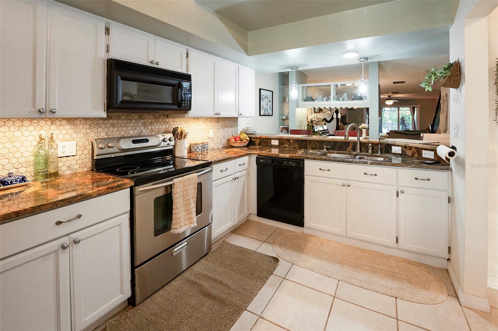 Kitchen with views of additional island/wet bar