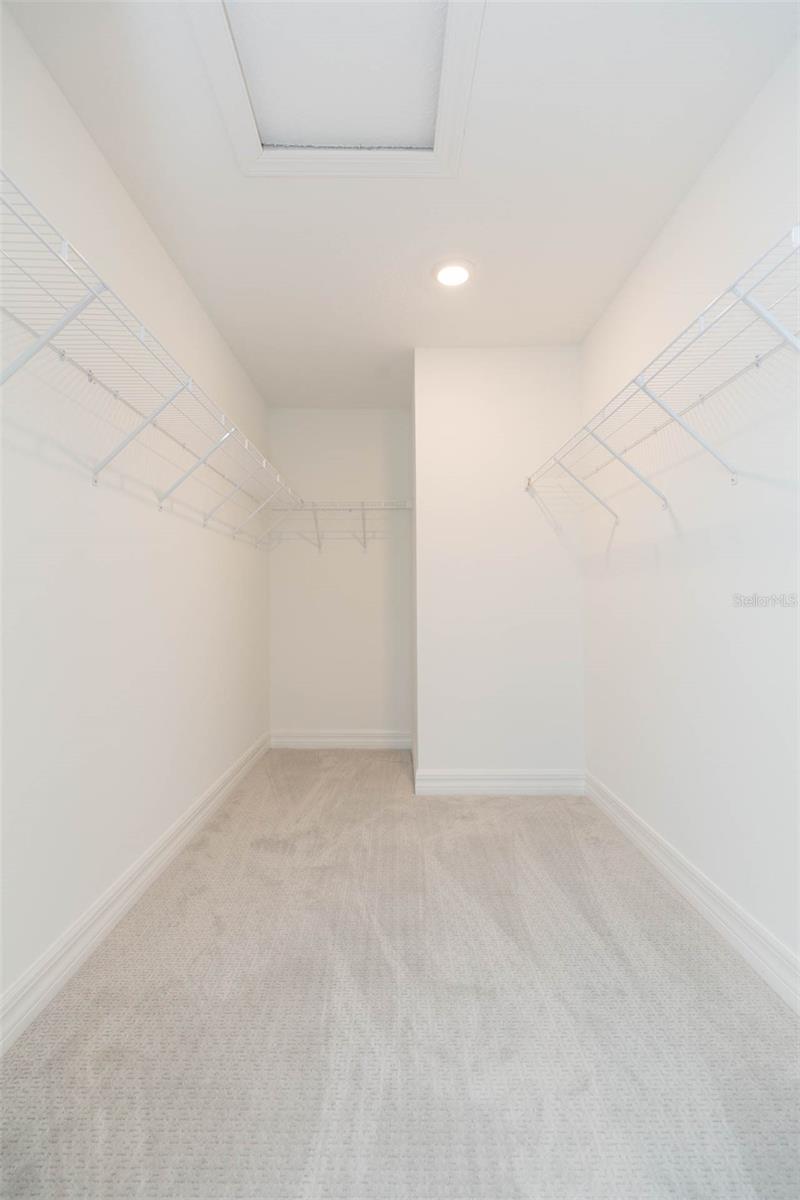 Master bedroom, walk-in closet.