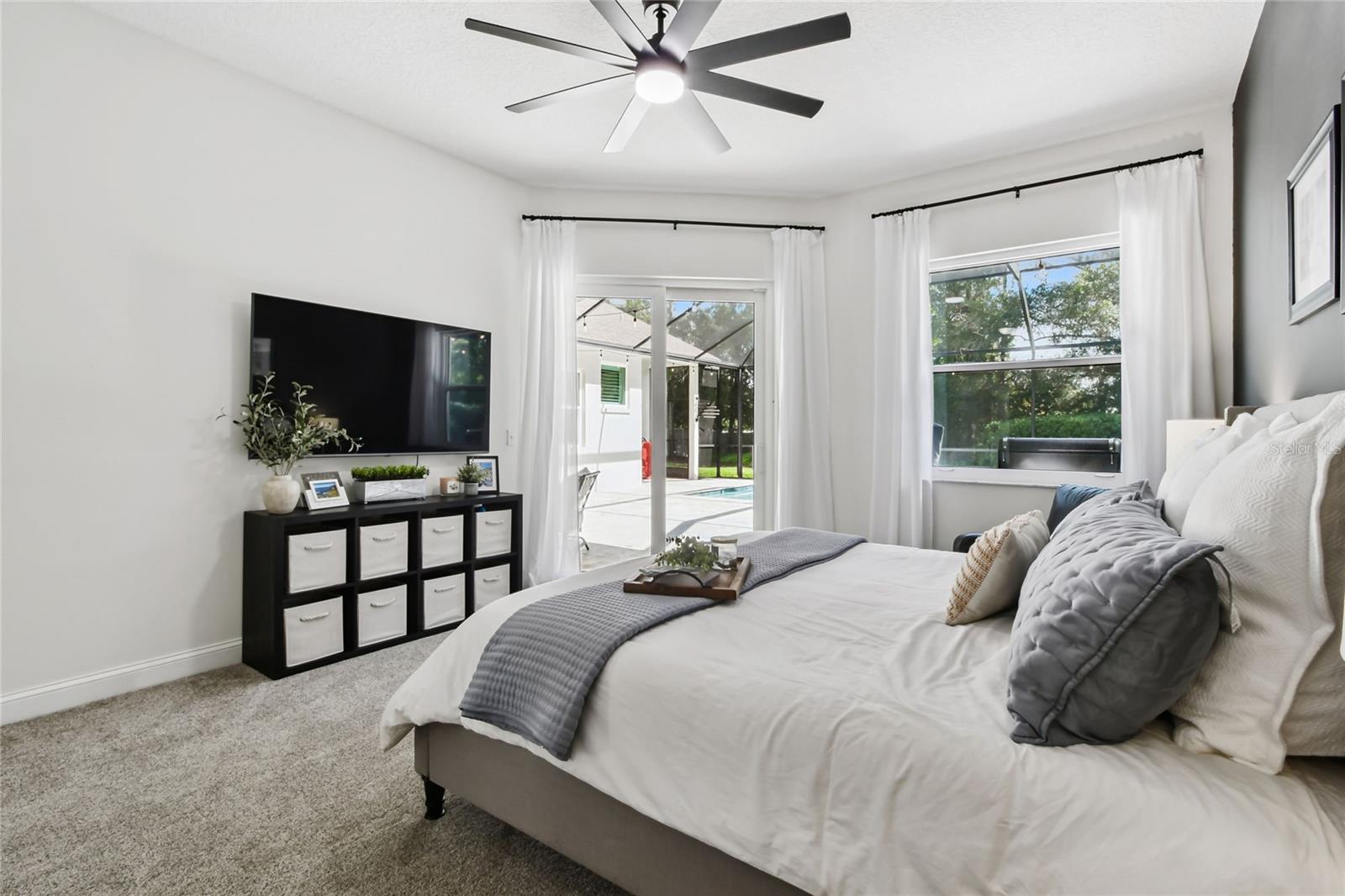 Owner's suite w/ glass sliders to the lanai