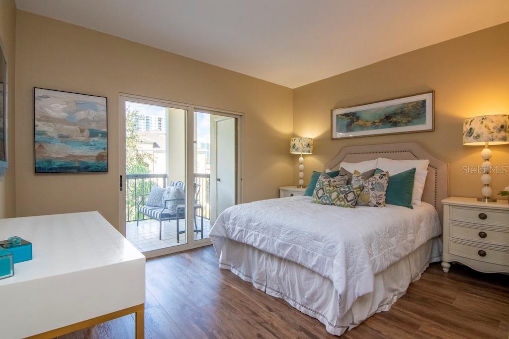 The second bedroom positioned across the unit with direct access to a beautifully appointed guest bathroom,