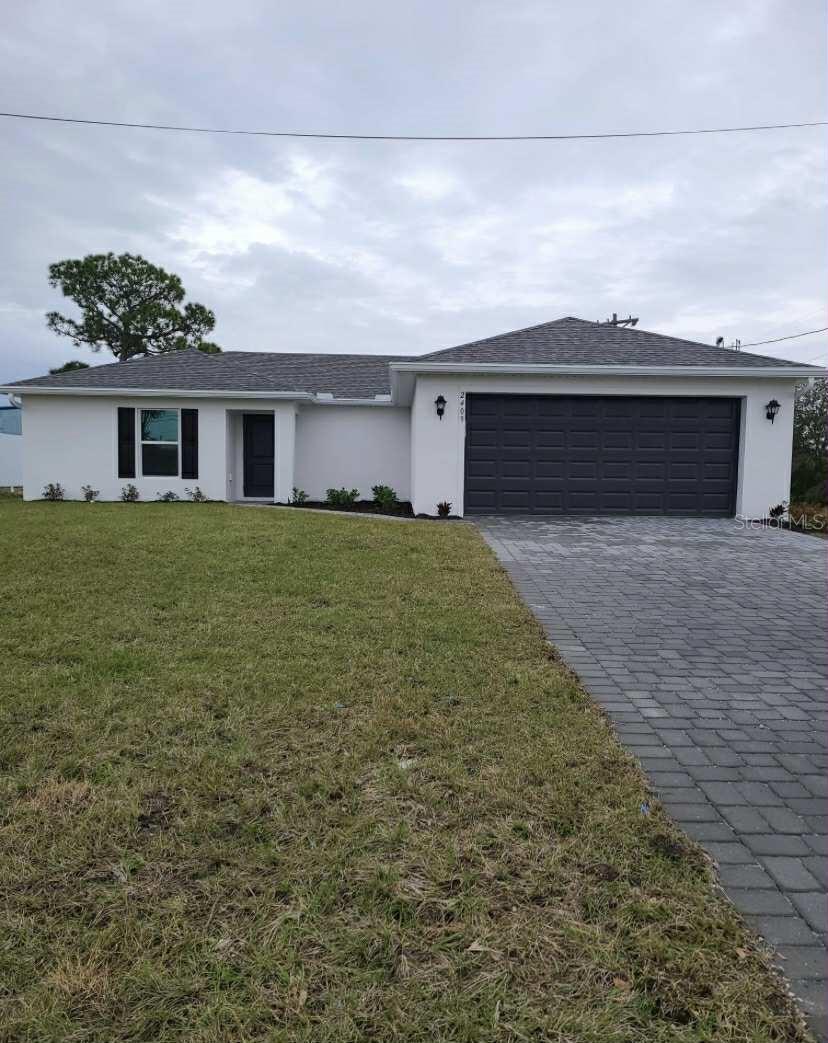 2409 NE 7TH PL, CAPE CORAL, FL, 33909