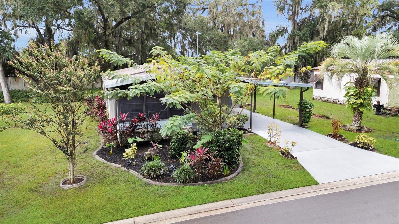 306 S TIMBER TRL, WILDWOOD, FL, 34785