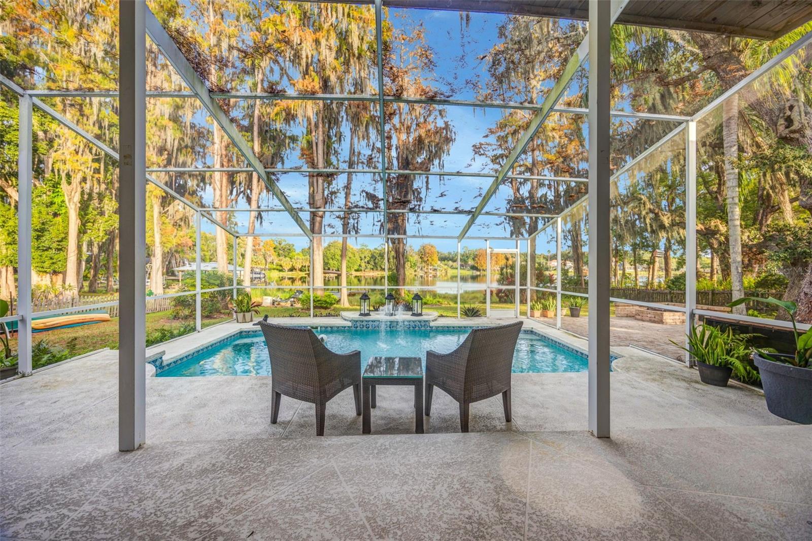 Beautiful screened pool enclosure with room to entertain