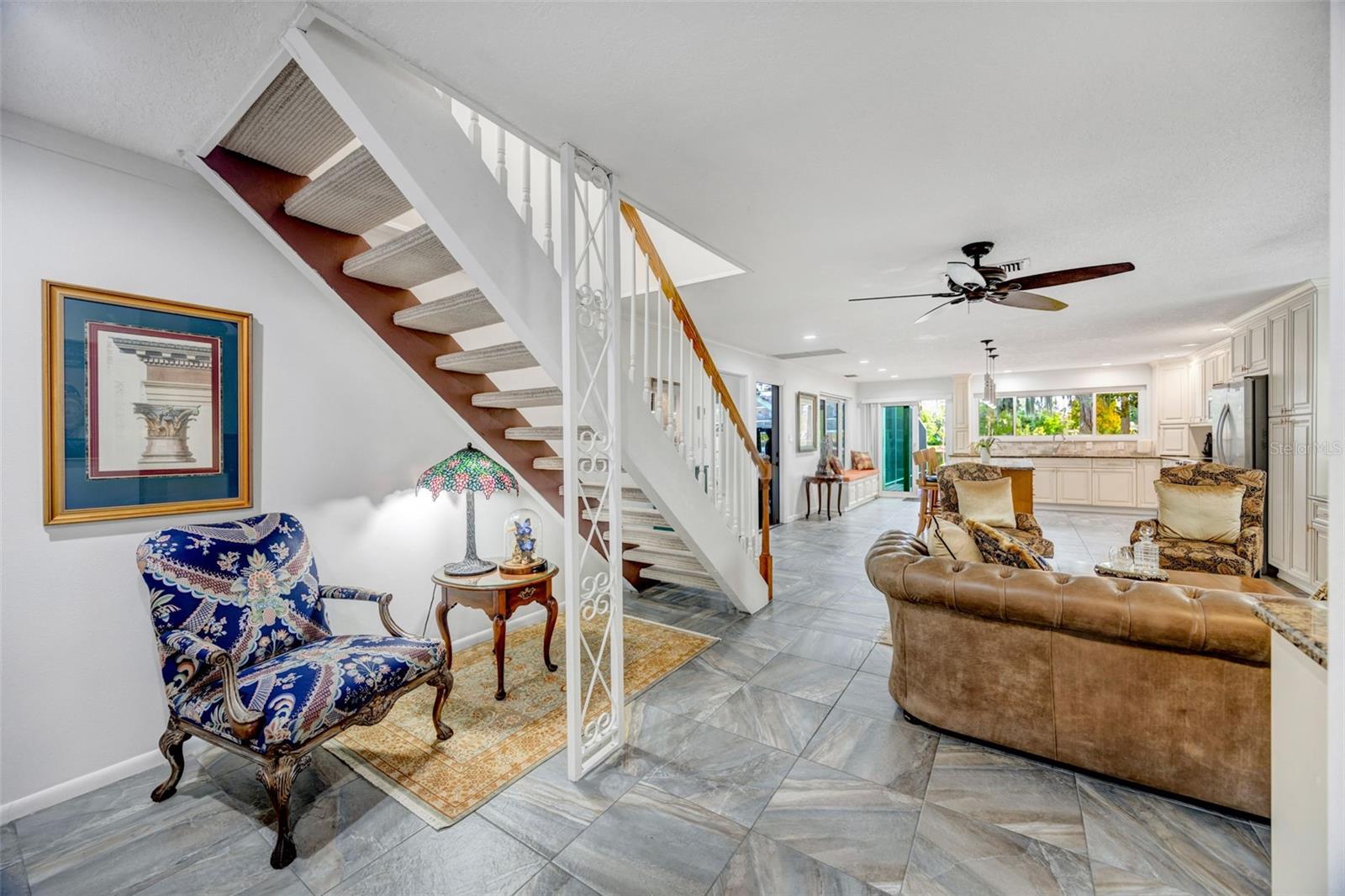 Sitting area under the stairs to the bonus room