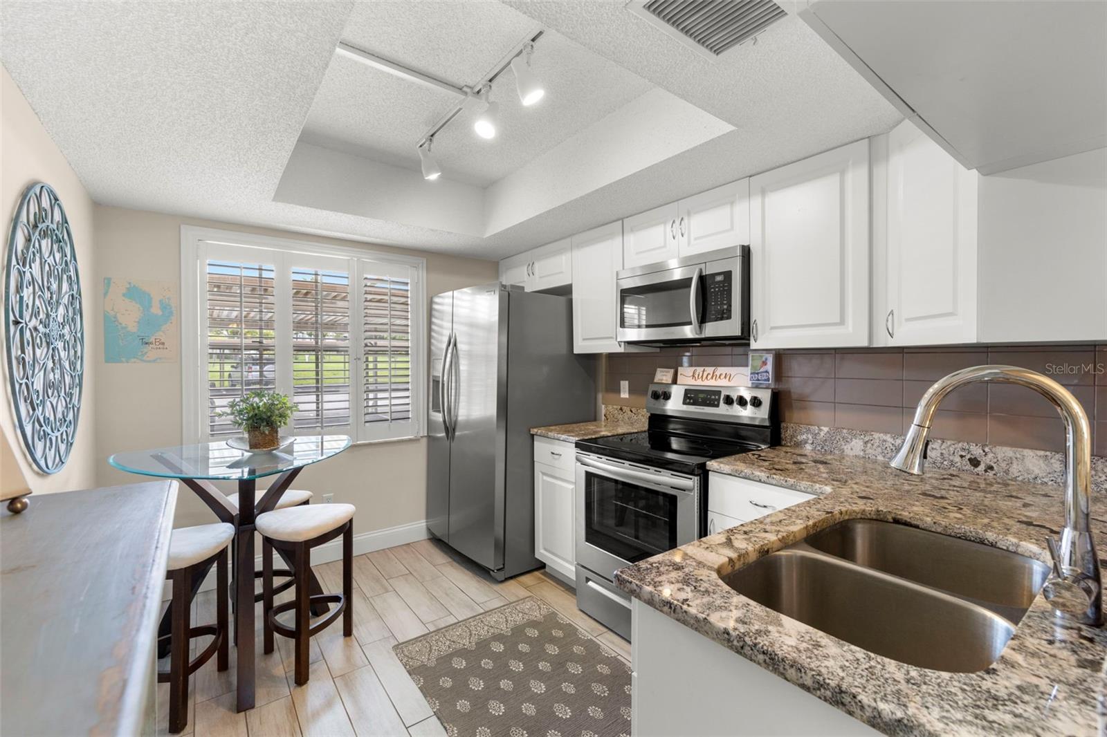 1370 HEATHER RIDGE BLVD #105, DUNEDIN, FL, 34698