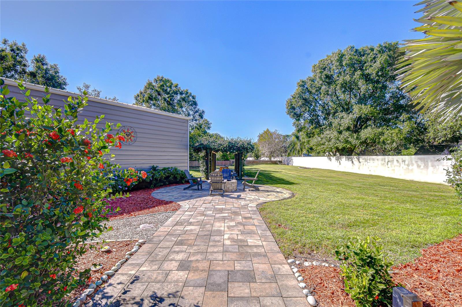 Paver Walkway to Patio and Fire Pit, continue on to Lighted Pergola!