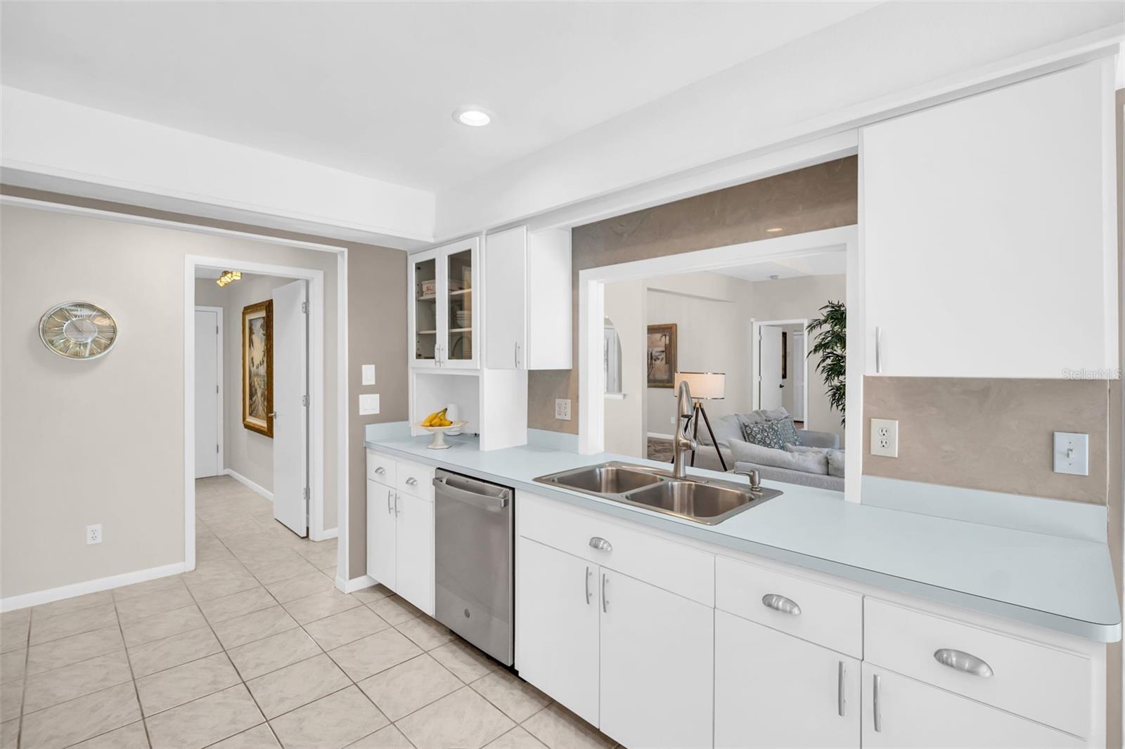 Open to laundry room & garage access~