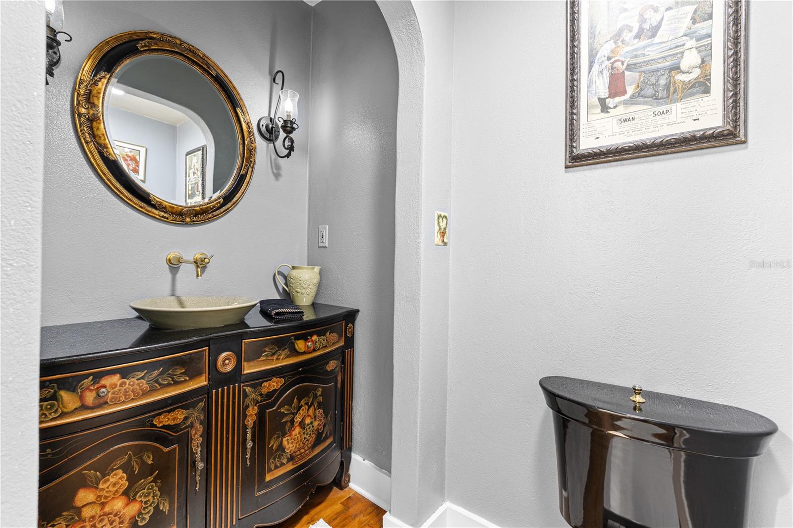 Stunning vanity in the hallway half bath.