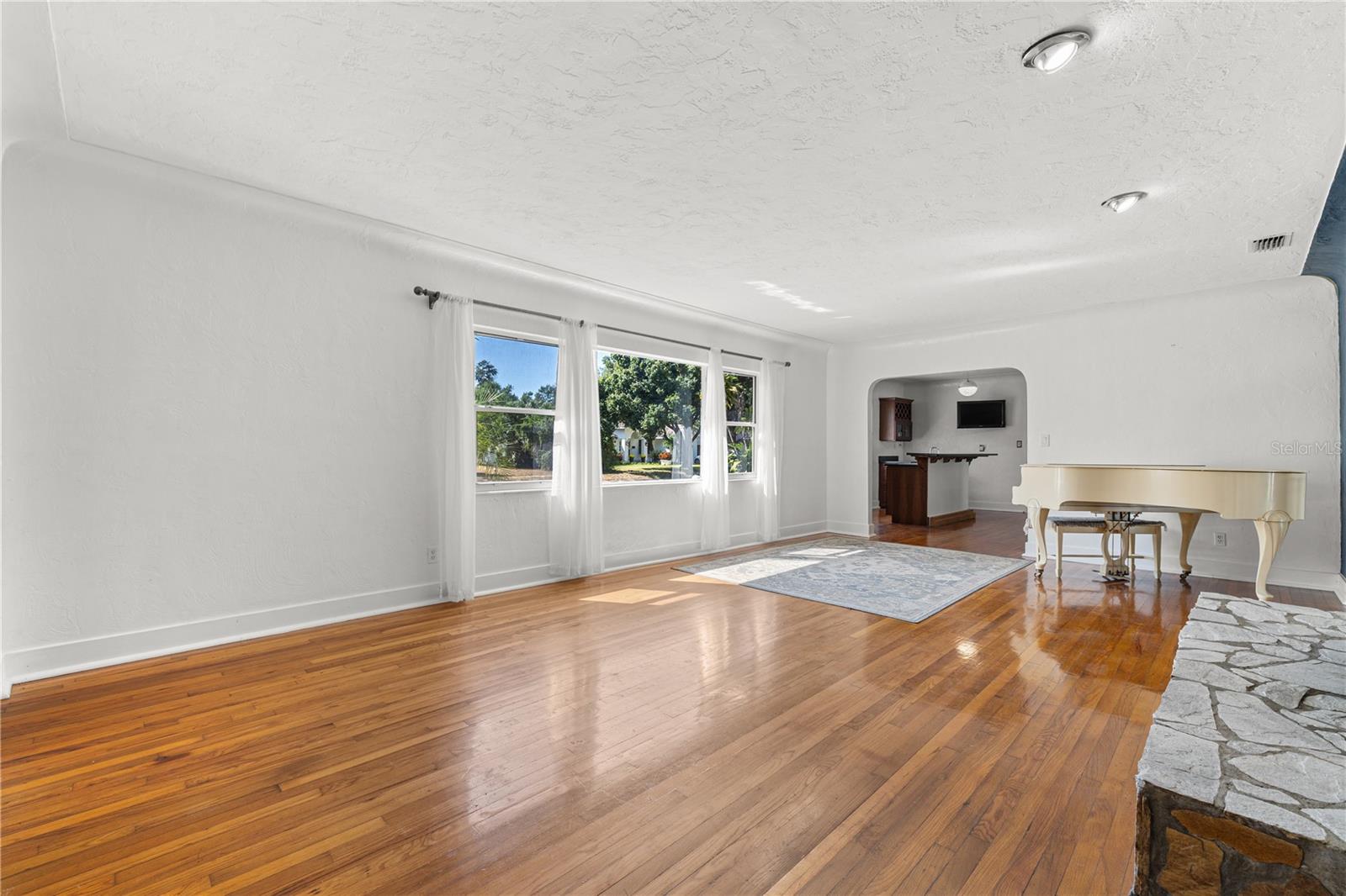Gorgeous hardwood floors run throughout.
