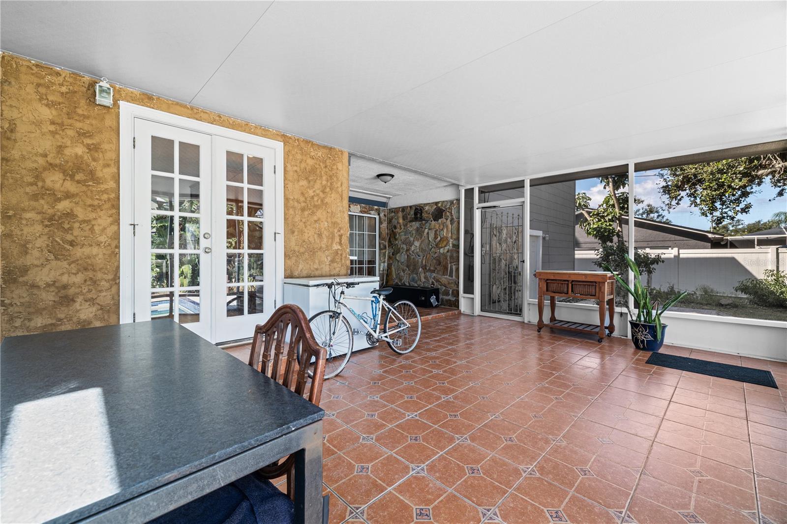 Beautiful french doors lead inside to the family room.