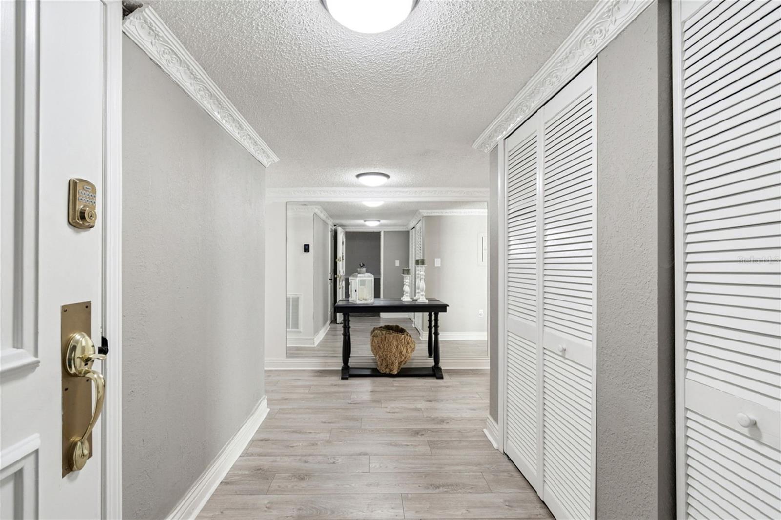 Entrance with large closets