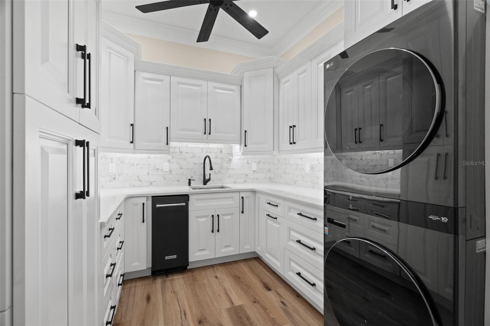 Luxurious Laundry Room with tons of Storage