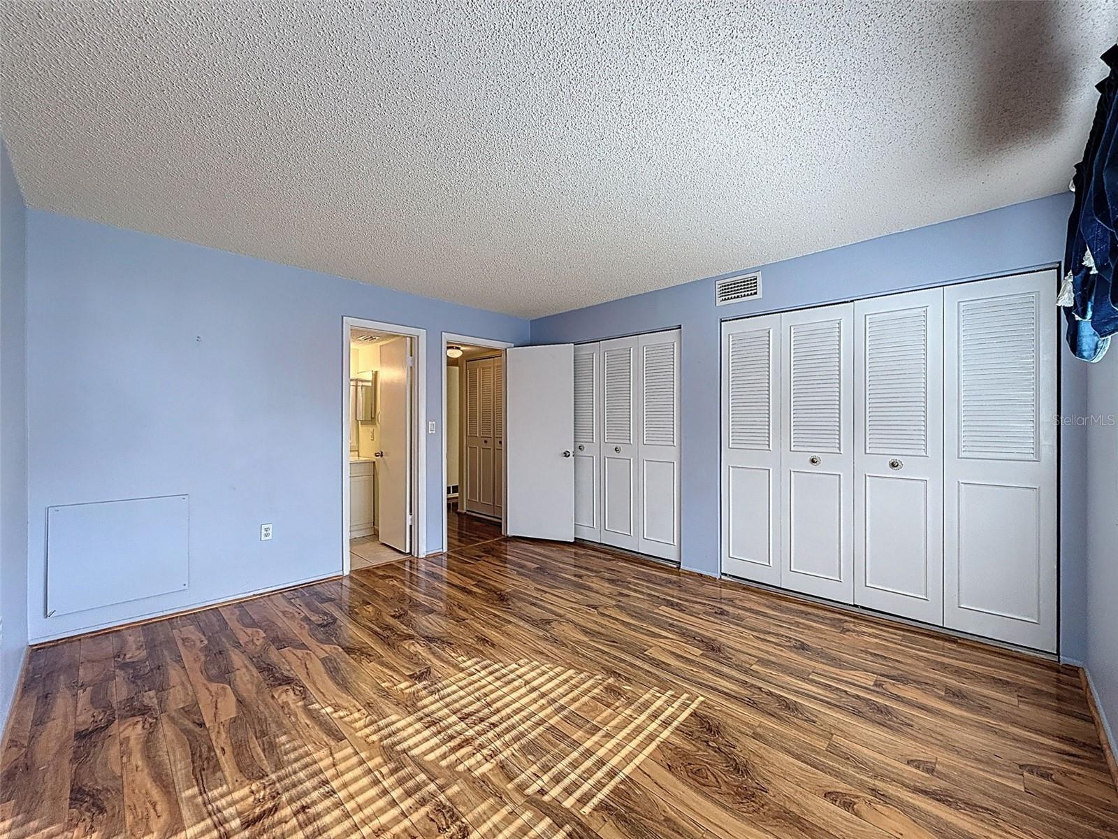 Primary bedroom with double closet